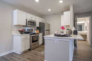 Custom kitchen cabinets with quartz countertops *